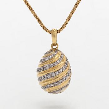 Cartier, a "Pendentif Oeuf"  diamond pendant and chain, 18K gold.