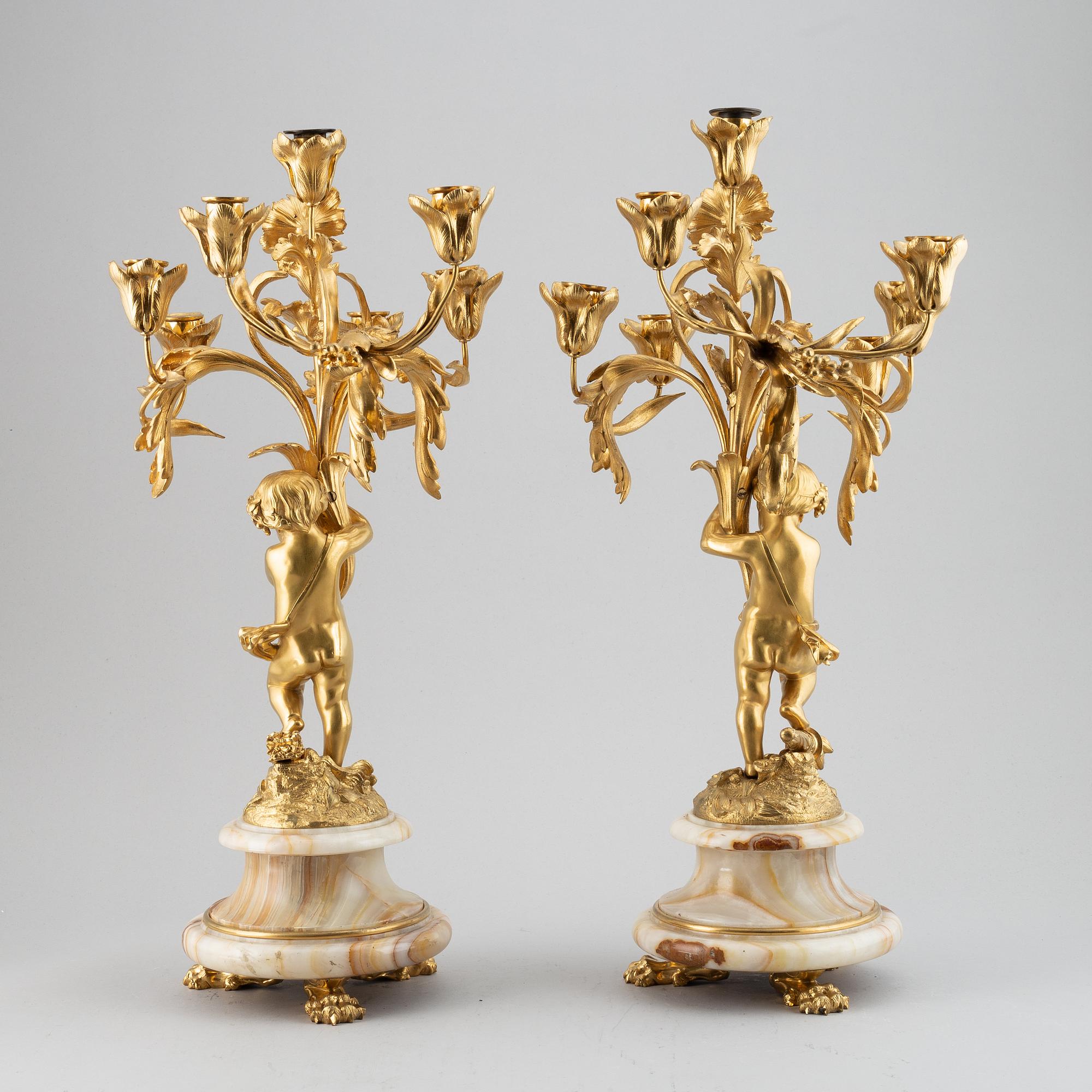 A pair of mid 19th century ormolu and onyx candelabra.