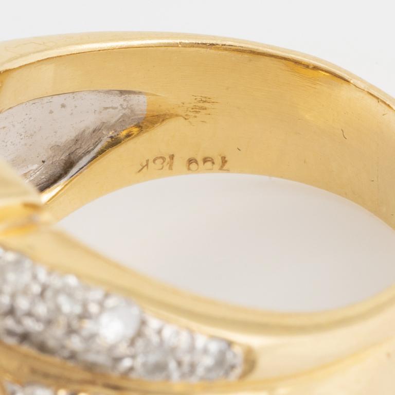 Cultured pearl and brilliant cut diamond ring.