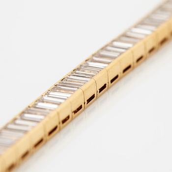 Van Cleef et Arpels armband 18K guld med baguetteslipade diamanter "Bracelet Baguette".