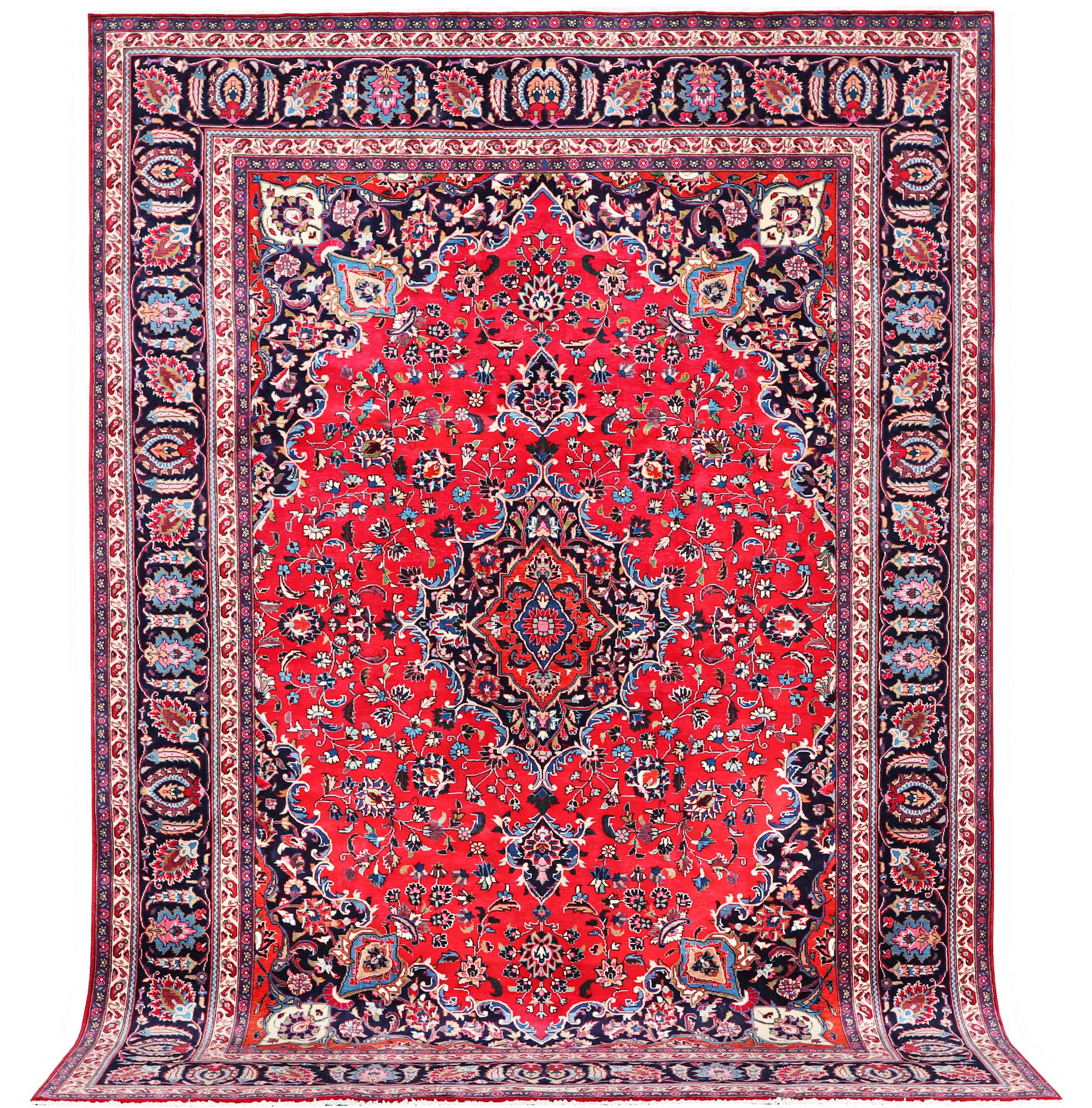 A Kashan carpet, signed, c. 358 x 244 cm.