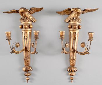 432. A pair of Regency-style 19th century two-light wall-lights.