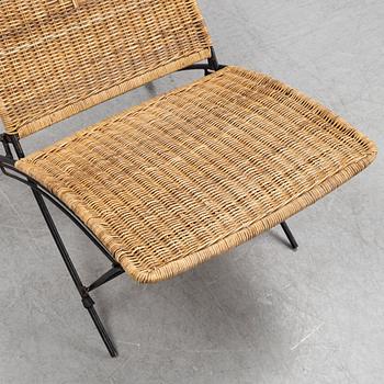 A rattan easy chair, 1960s.