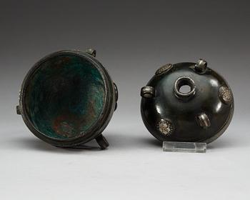 An archaistic bronze censer with cover.