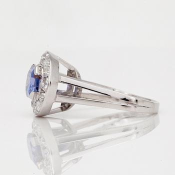 Rey Urban, A circa 3.10ct purple sapphire and diamond ring. Total carat weight circa 0.94ct. Rey Urban, 1970.