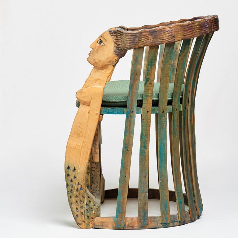 Gérard Rigot, a sculptured and signed armchair, late 20th century.