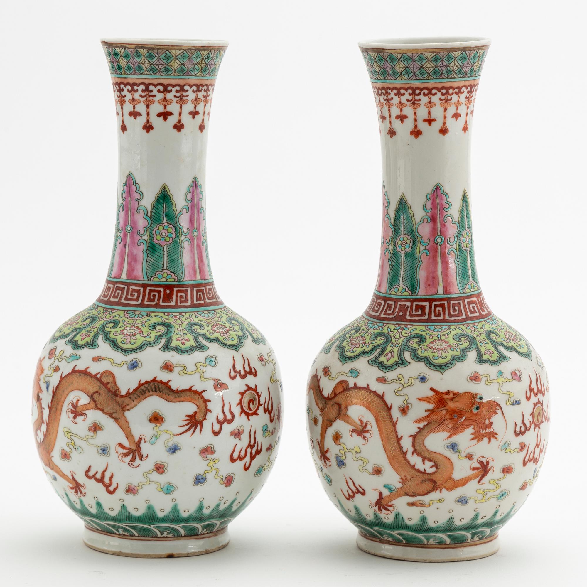 A pair of Chinese porcelain 'dragon' vases, presumably first half of the 20th Century.