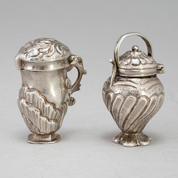 Two 18th century silver snuff bottles with faint marks. Total weight 46 g.