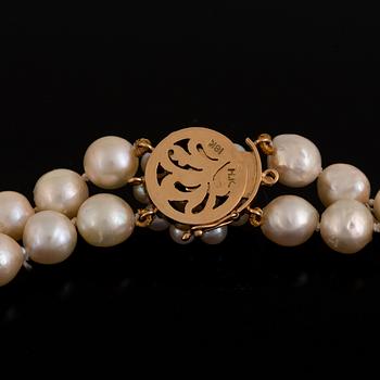 A two strand cultured pearl necklace.