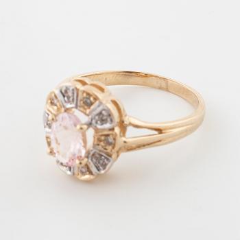 A morganite and brilliant cut diamond ring.