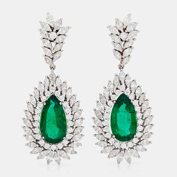 1192. A pair of zambian emerald and diamond earrings.