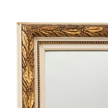 A  Gustavian style mirror first alf of the 20th century.