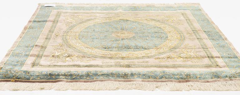 A silk rug, oriental, ca 163 x 166 cm.