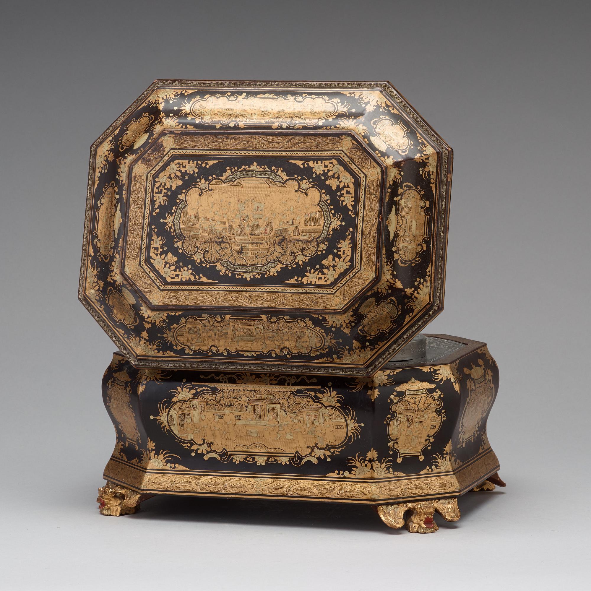 A lacquered tea box with pewter canisters, Qing dynasty, late 19th Century.