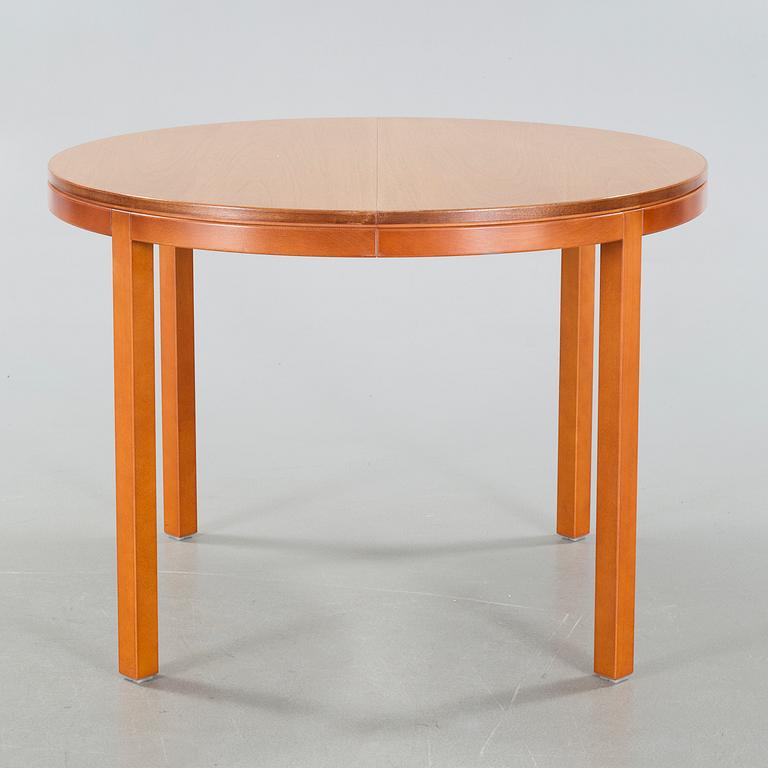 A late 20th century dinner table.