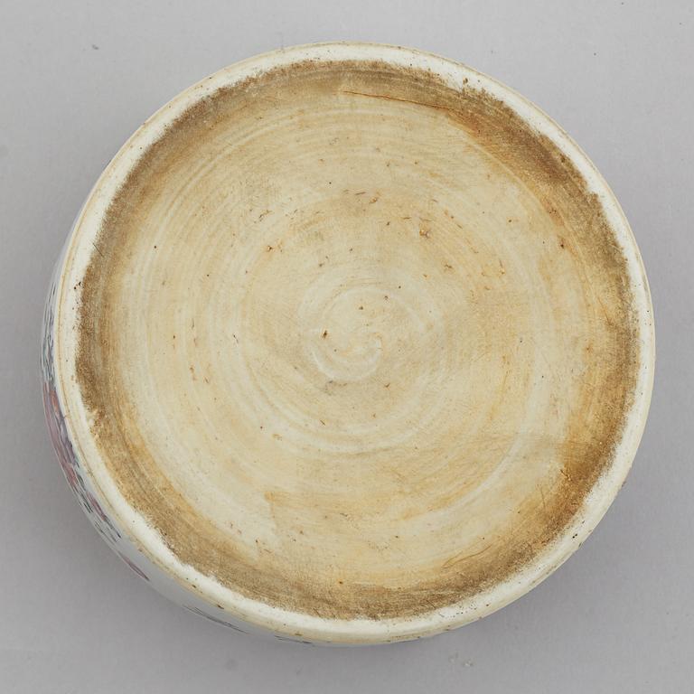 A famille rose butter tureen with cover and two cups with three odd stands, Qing dynasty, Qianlong (1736-95).