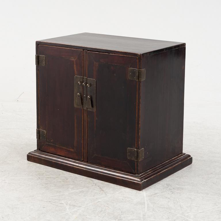 A Chinese hardwood cabinet, later part of the 20th Century.