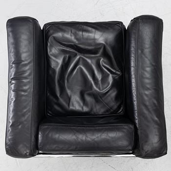 a pair of "LC2" armchairs, Cassina, second half of the 20th century.