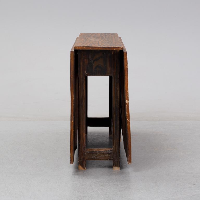 A 19th Century painted gate leg table.