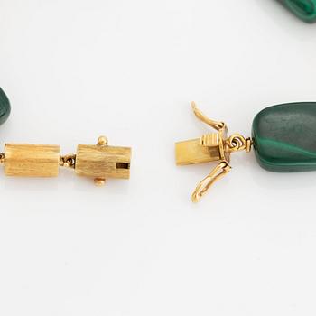 A 14K gold and malachite bracelet.