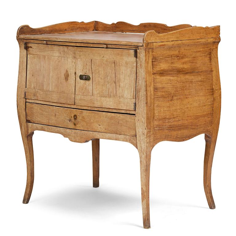 A Swedish rococo chamberpot cupboard, later part 18th century.