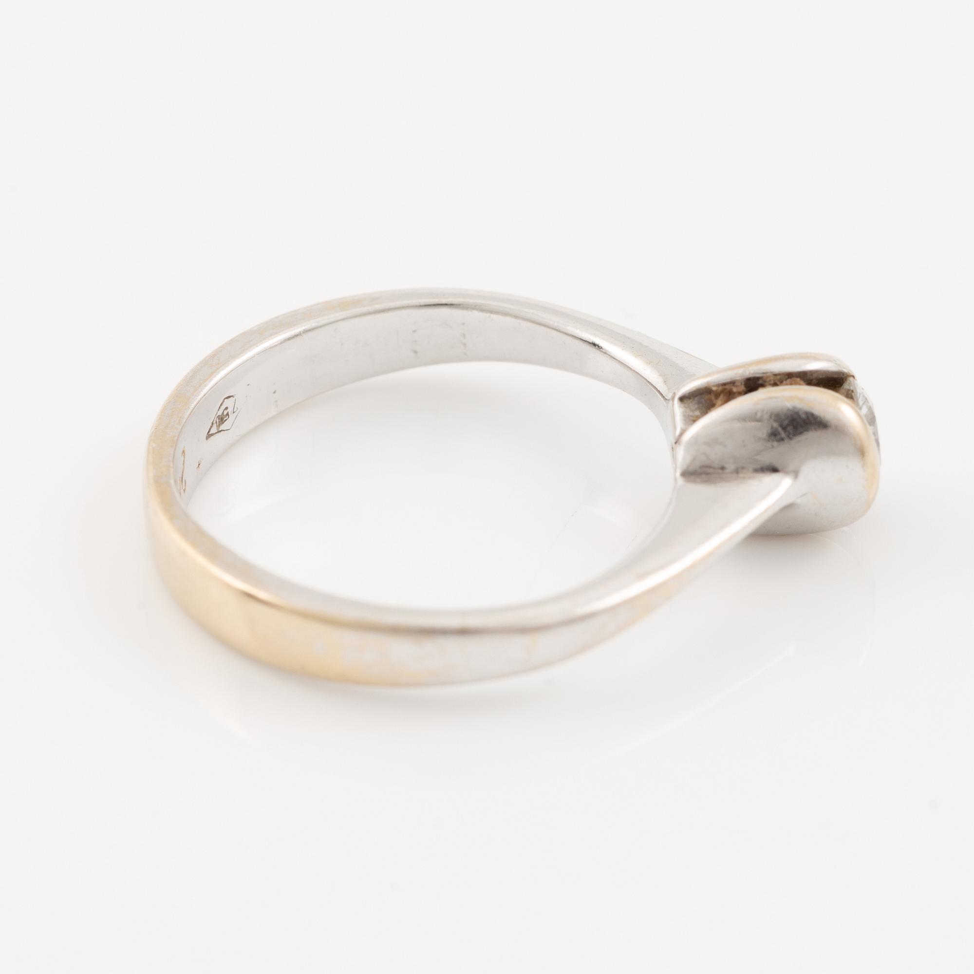 Ring, 18K white gold with a brilliant-cut diamond.