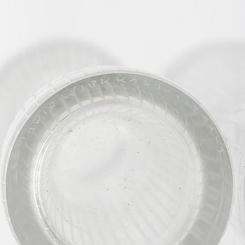 Tapio Wirkkala, four line-cut clear glass vases, signed Tapio Wirkkala Iittala.