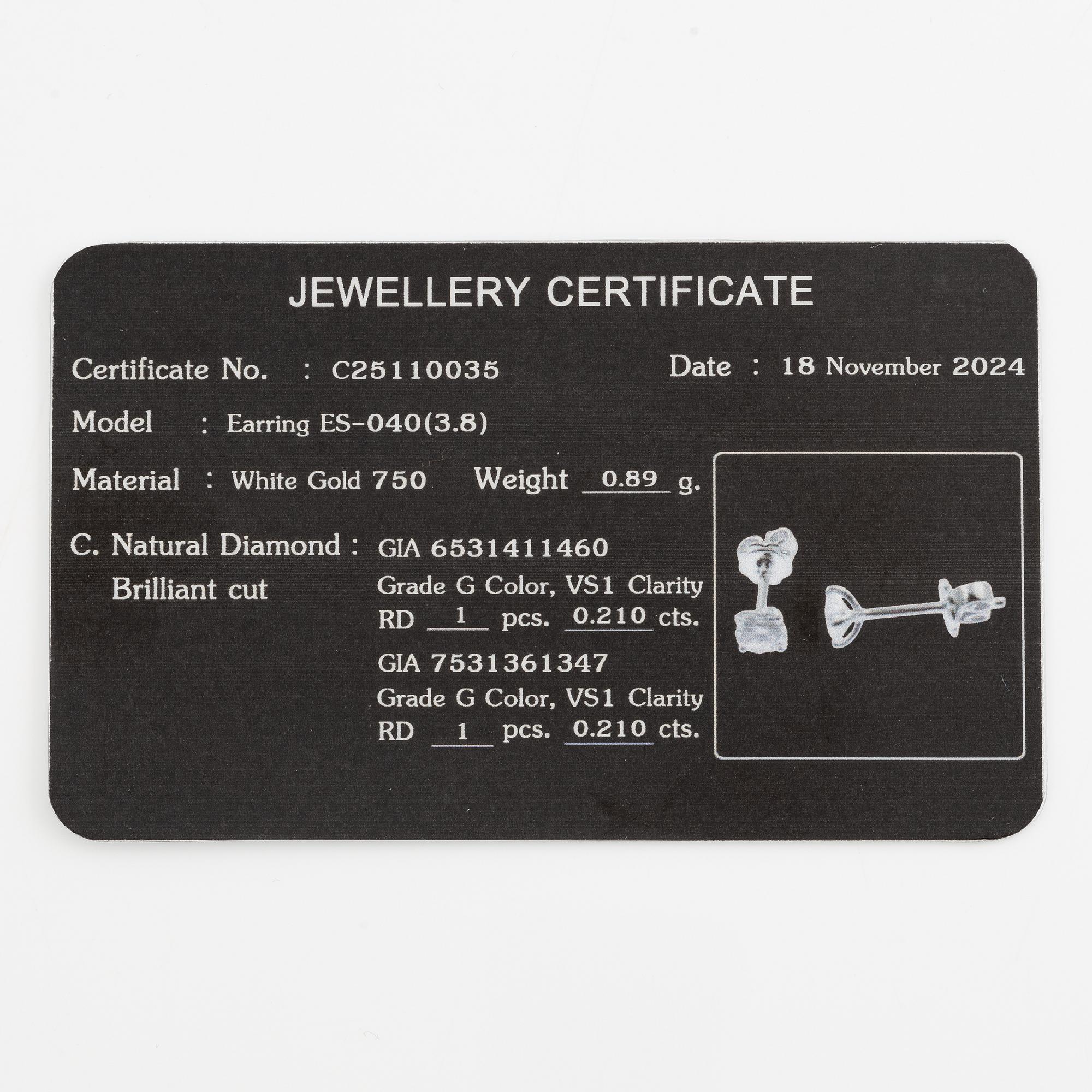 Earrings 18K white gold set with brilliant-cut diamonds accompanied by GIA dossier.