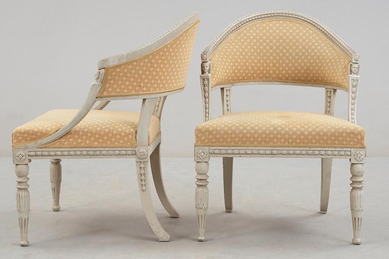 A pair of late Gustavian early 19th century armchairs.