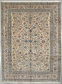 A Keshan rug, 408 x 297 cm.