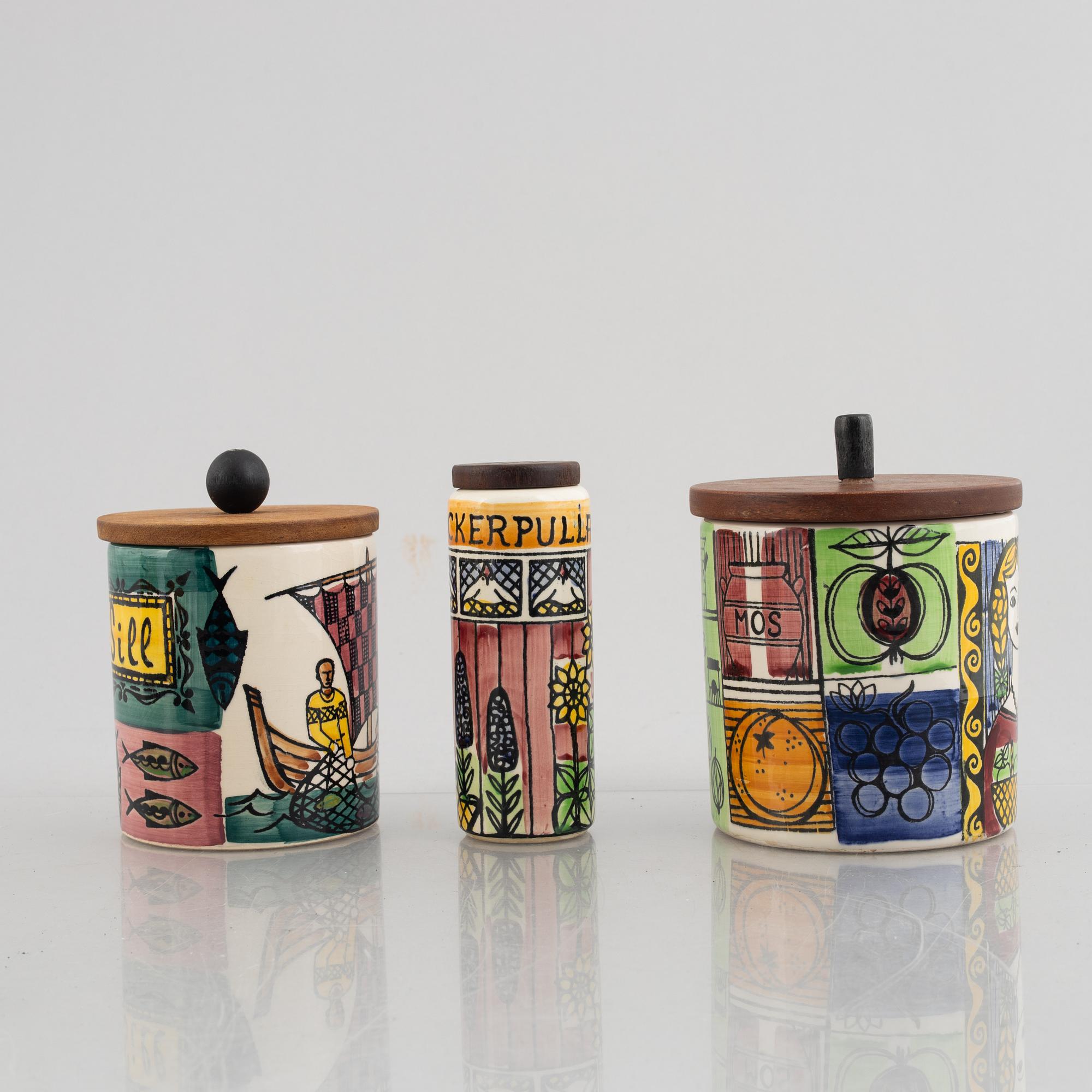 A set of five creamware jars with covers and a sugar caster,  including Anita Nylund, 'Vår lilla stad', Jie, Gantofta.