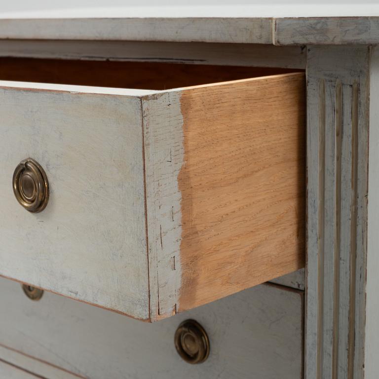 A Gustavian style chest of drawers, early 20th Century.