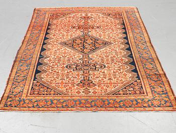 A rug, antique Malayer, ca 201,5 x 131,5 cm.