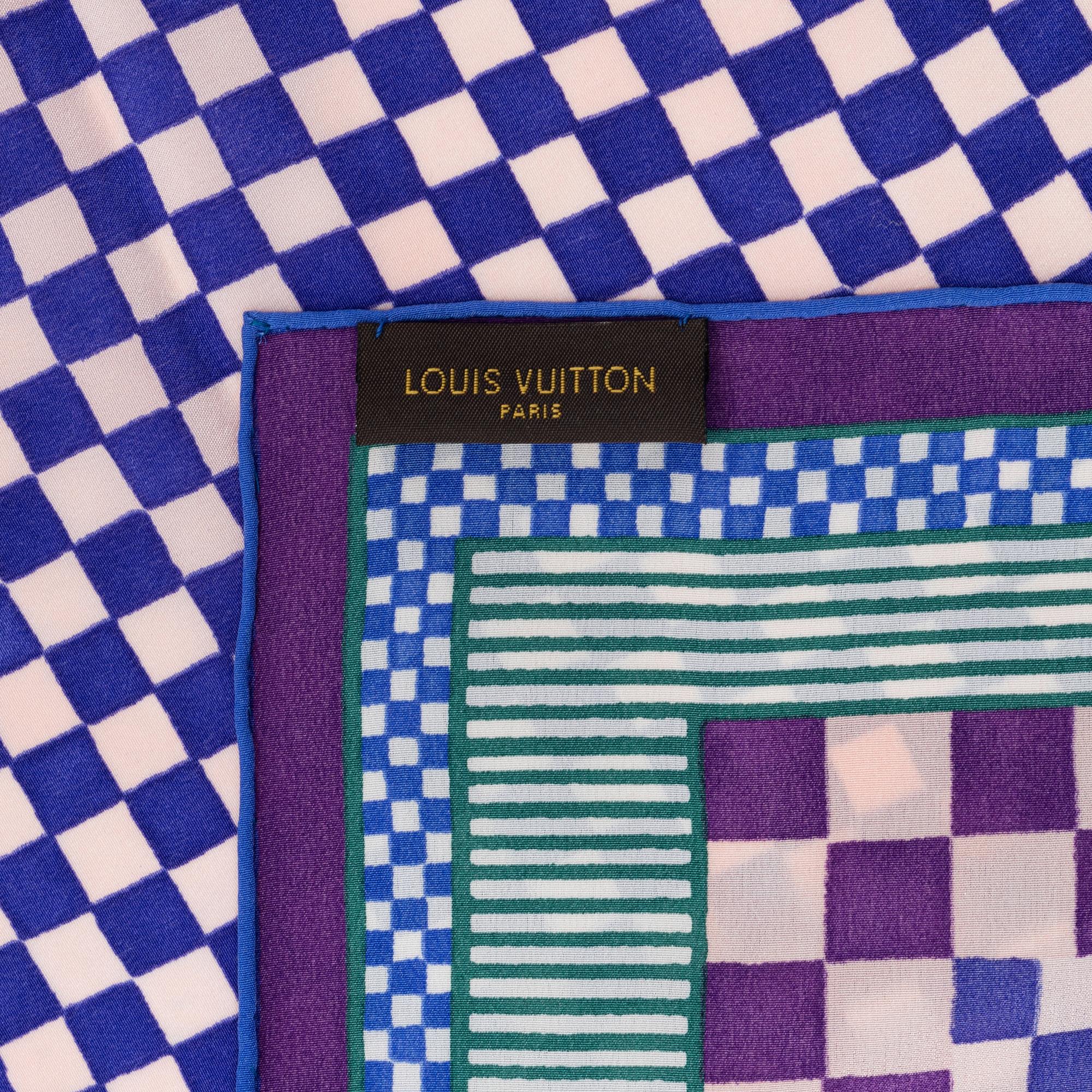 Louis Vuitton, a silk scarf.