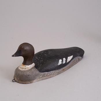 4 painted wooden ducks from the 20th century.