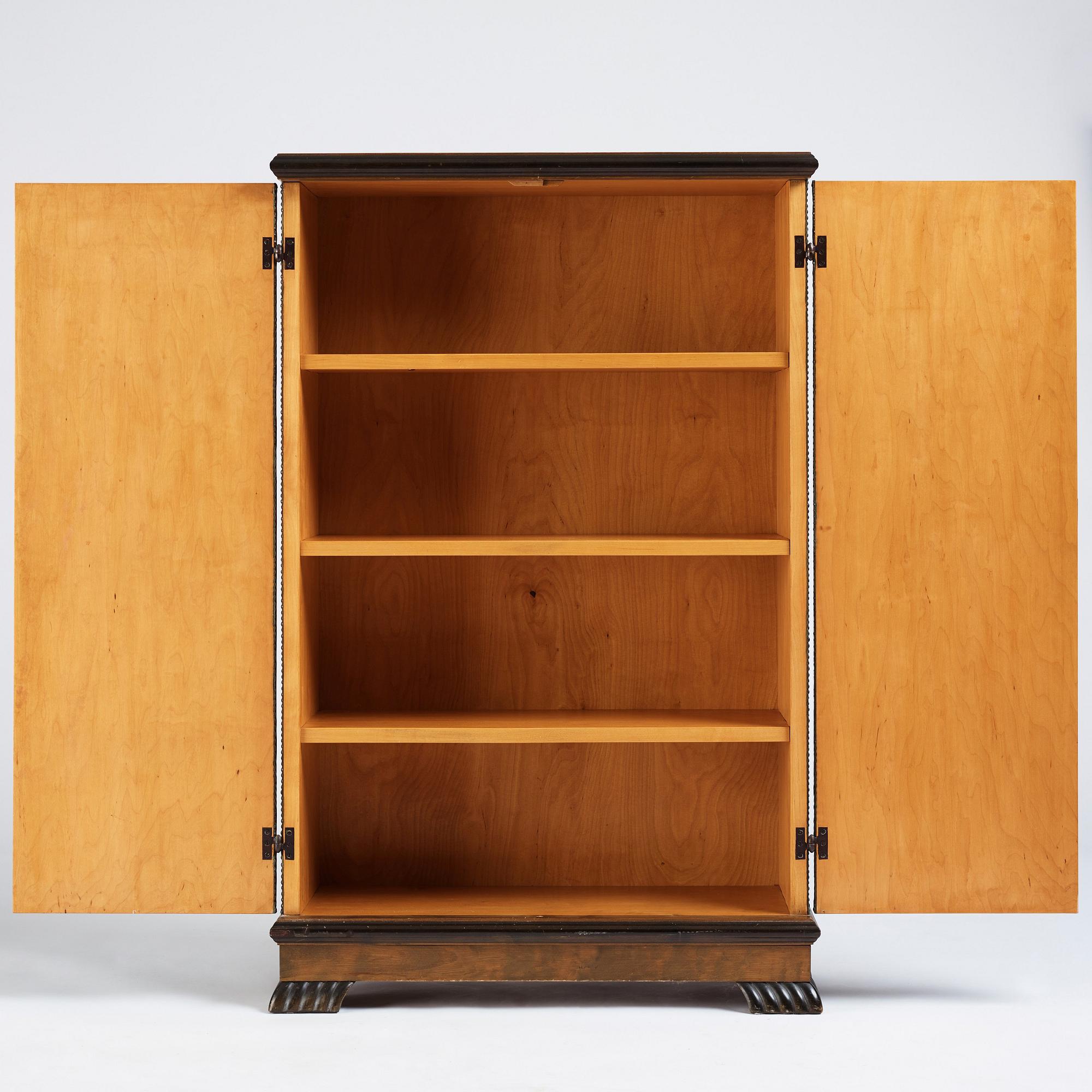 Otto Schulz, a velvet covered Swedish Modern cabinet, Sweden, late 1920s.