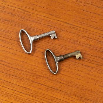 A teak-veneered sideboard, 1950's/60's.
