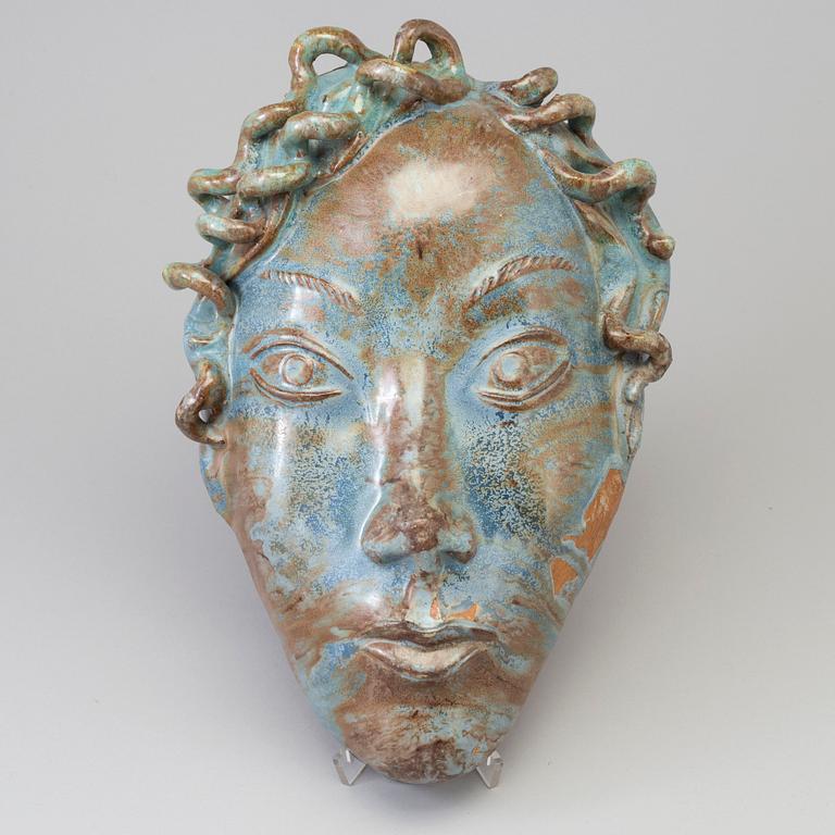 ALLAN EBELING, an earthenware wall sculpture, signed and dated 9/10 1944.