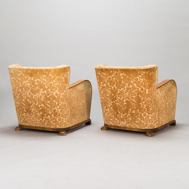 A pair of 1930's armchairs.