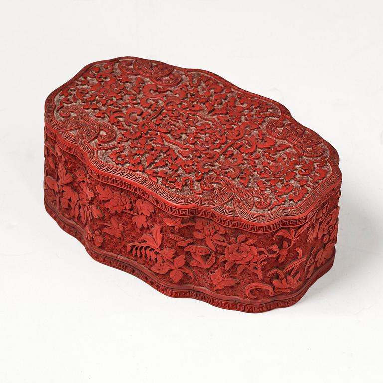 A fine carved lacquer box and cover with tianqi lacquer inset boxes and covers, Qing dynasty, Qianlong (1736-95).