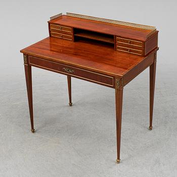 A Louis XVI-style writing desk, 20th ct.