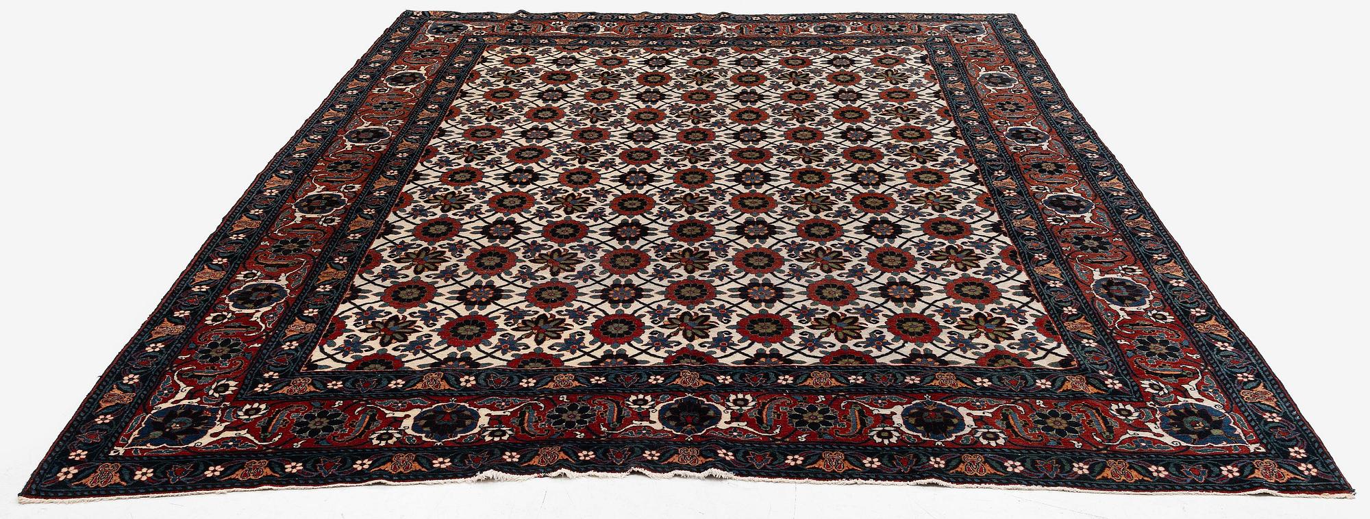 An antique Veramin carpet, West Persia, 380 x 271 cm.