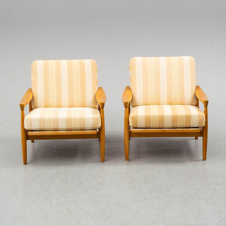 ERIK WÖRTZ, a pair of oak 'Kolding' easy chairs from IKEA, 1960's.