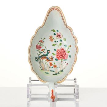 A group of famille rose 'double peacock' serving dishes, Qing dynasty, Qianlong (1736-95). (8 pieces).