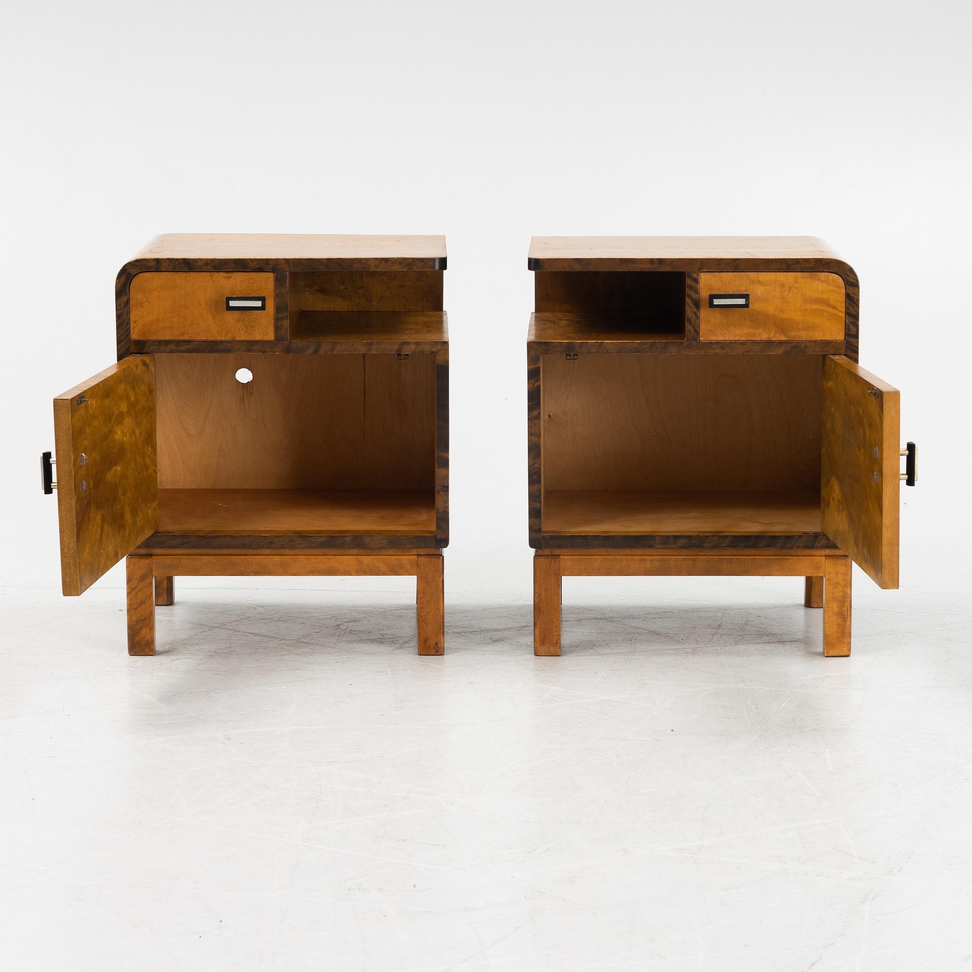 A pair of birch veneered 1930's bedside tables.