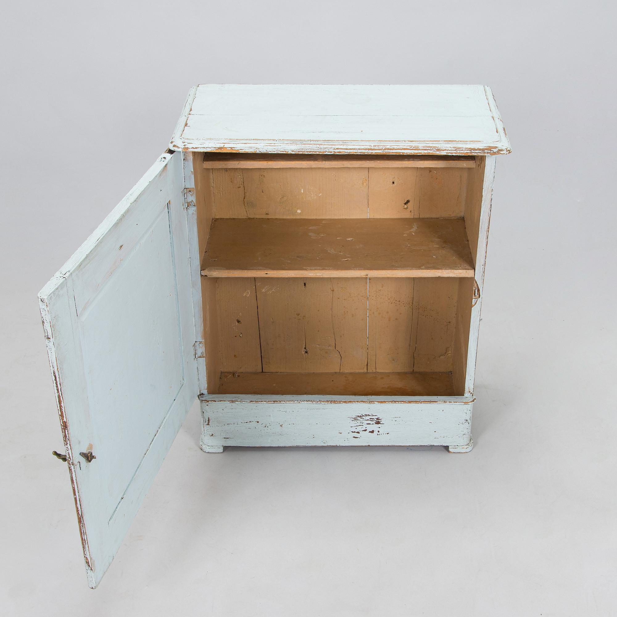 A painted cabinet, circa 1900.
