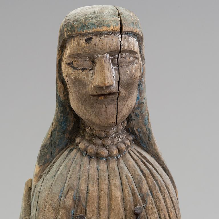 A wooden 19th century sculpture.