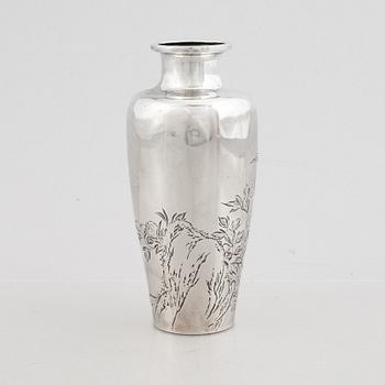 A Japanese silver vase, 20th century. Signed. Weight 160 grams.