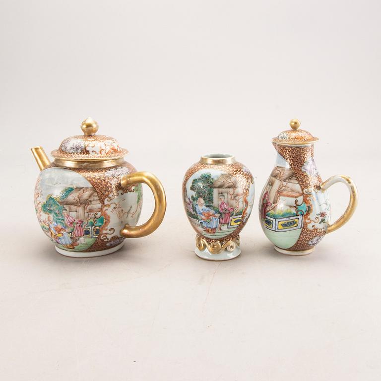 A Chinese Qianlong porcelain teapot, creamer and tea caddy.