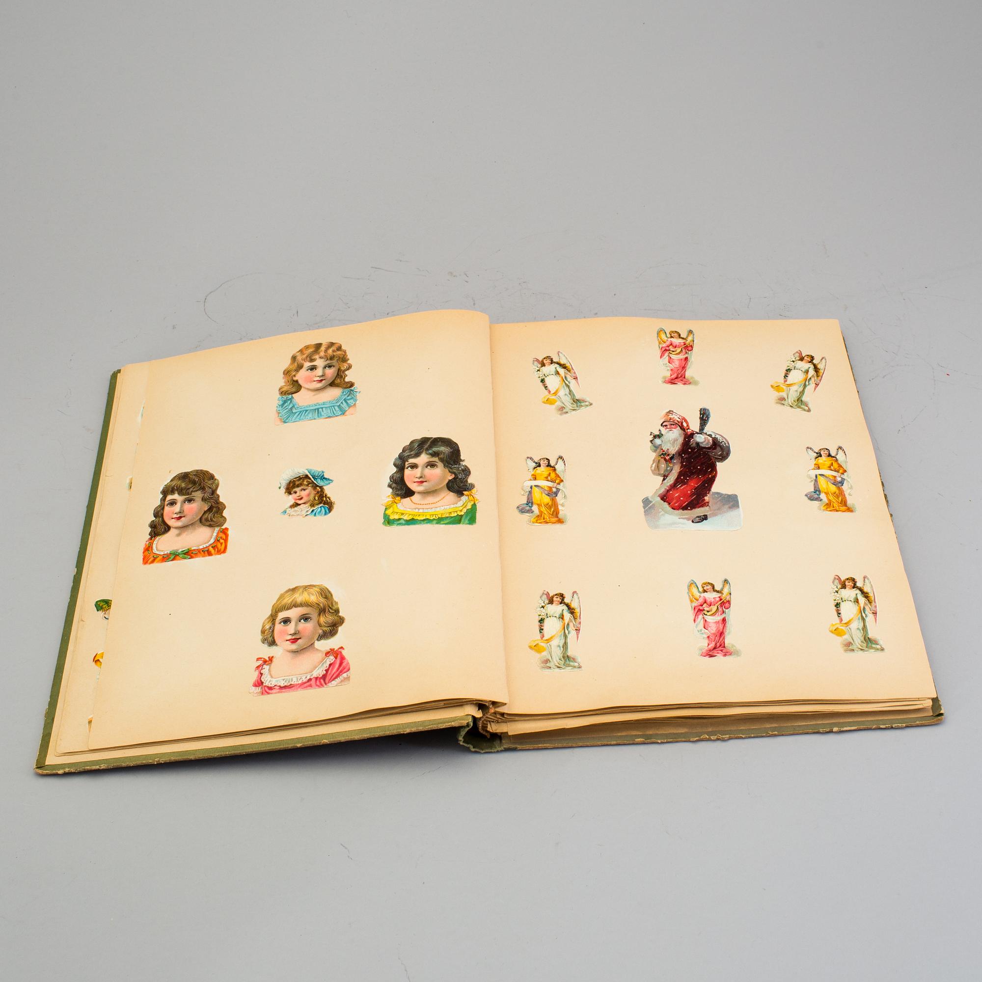 An early 20th century album with paper bookmarks.